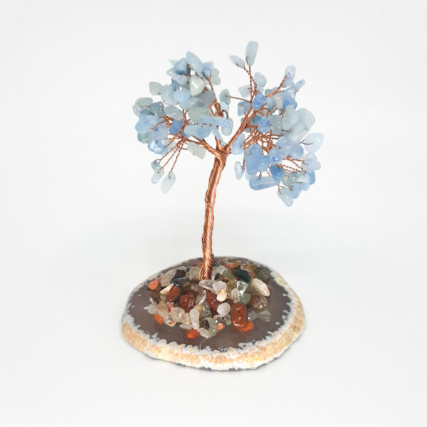 Handcrafted Aquamarine gemstone Tree of Life with blue crystal chips, copper wire branches and natural stone base