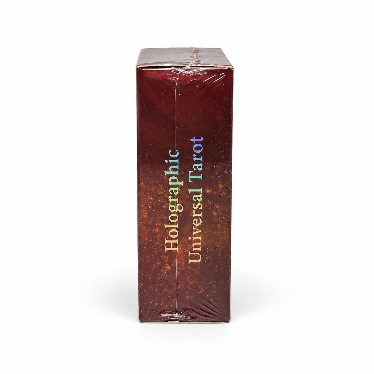 A tall rectangular box for a holographic universal tarot deck, wrapped in clear plastic. The box features a dark reddish-brown glittery background with vertical text reading 'Holographic Universal Tarot' in gold, blue, and green.
