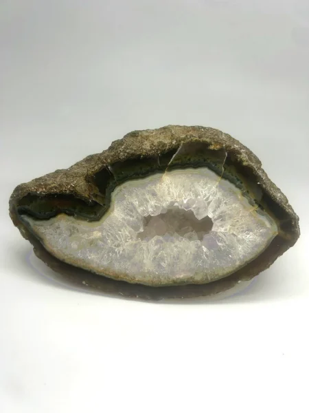 Natural Agate geode slice with dark banding, sparkling white druzy Quartz centre and raw outer edge