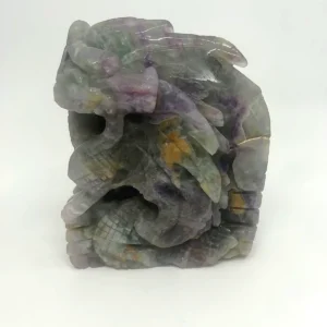 Hand-carved Rainbow Fluorite Dragon with natural green and purple fluorite banding.