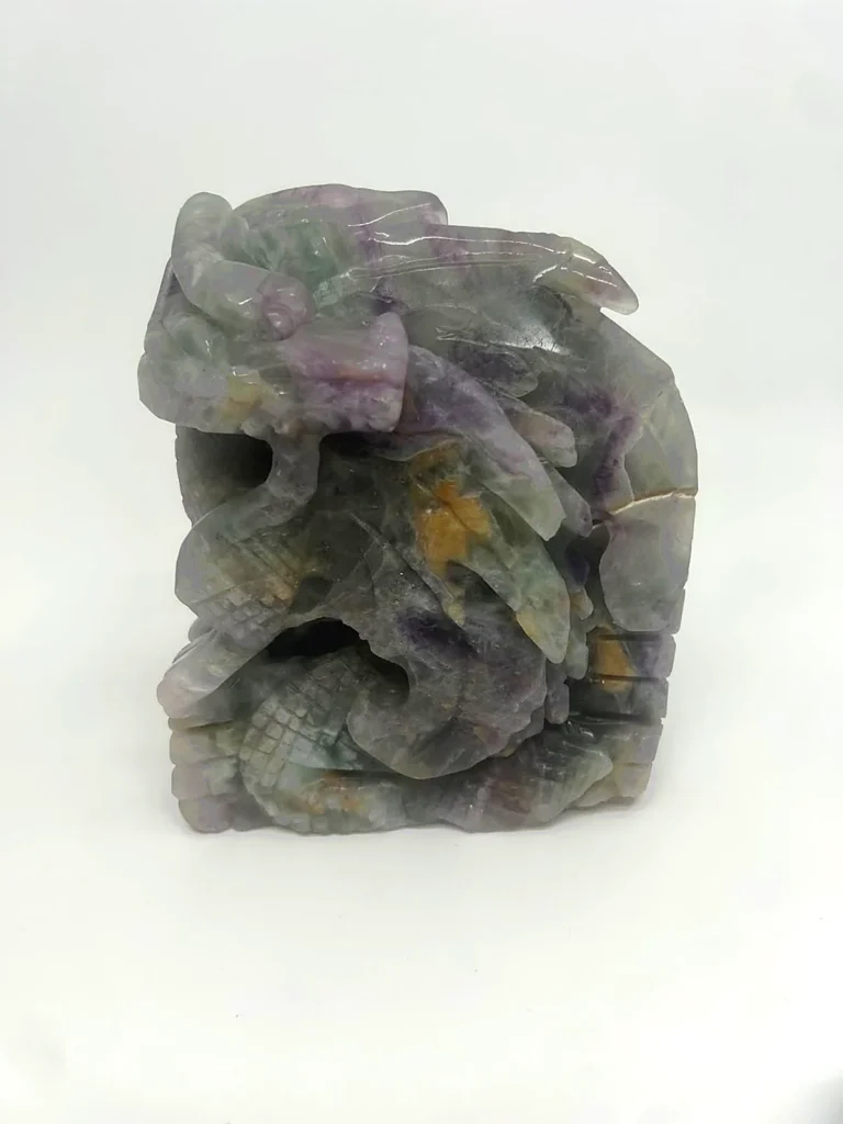 Hand-carved Rainbow Fluorite Dragon with natural green and purple fluorite banding.