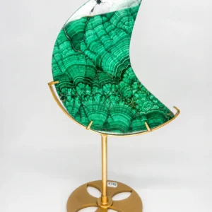 Natural Malachite Crescent Moon displayed on a gold stand